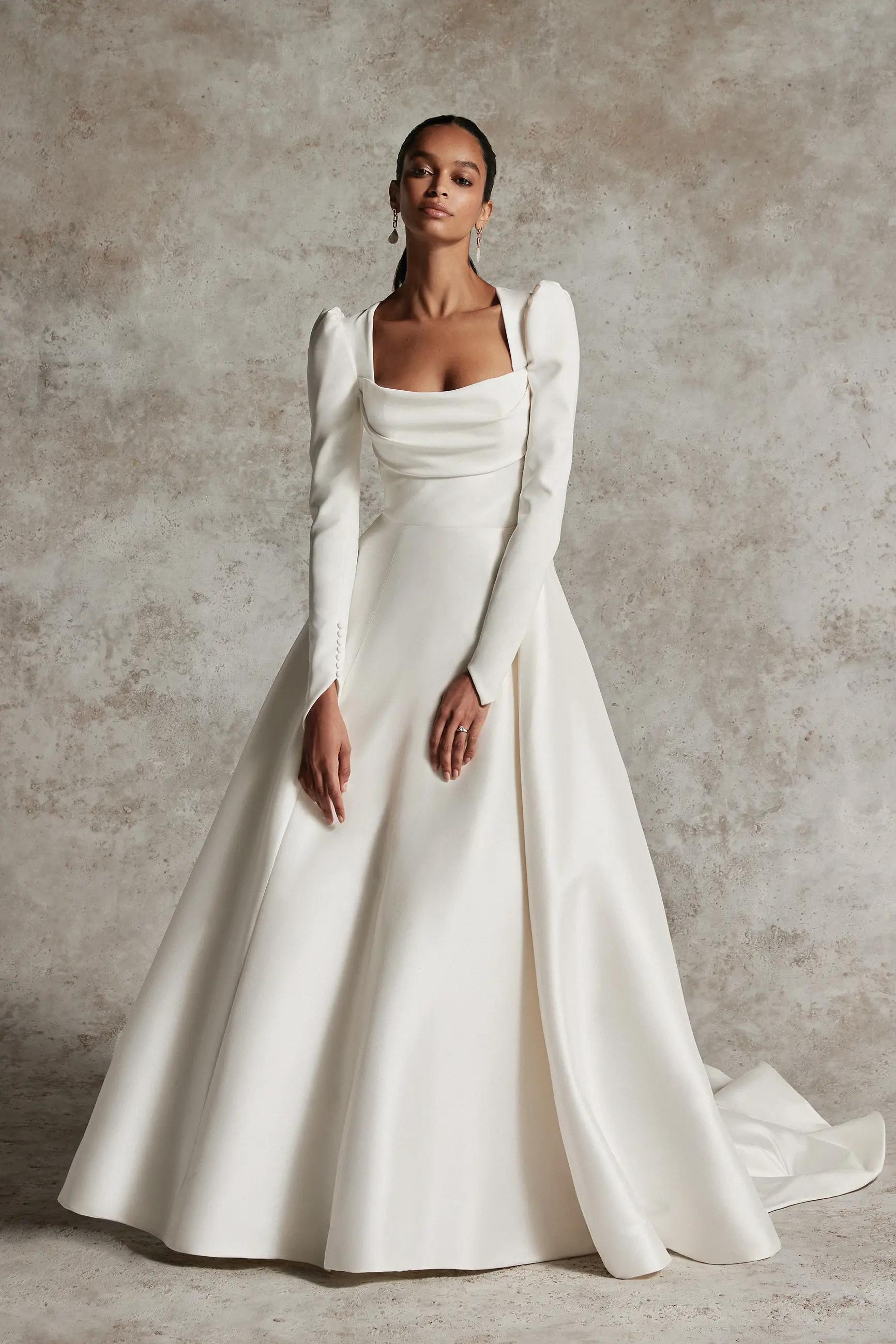 Sleeves of Elegance: Embracing Long Sleeves in December Bridal Fashion. Desktop Image